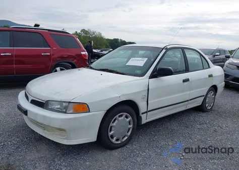 2001 Mitsubishi Mirage Es z USA, uszkodzony, nr VIN JA3AY26C11U038582